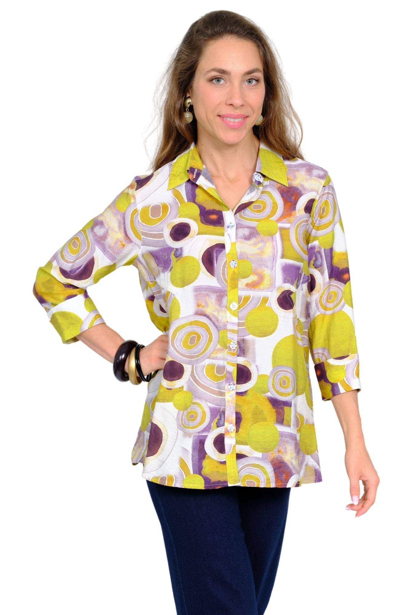 Women's lime green button down top with long sleeves and abstract print