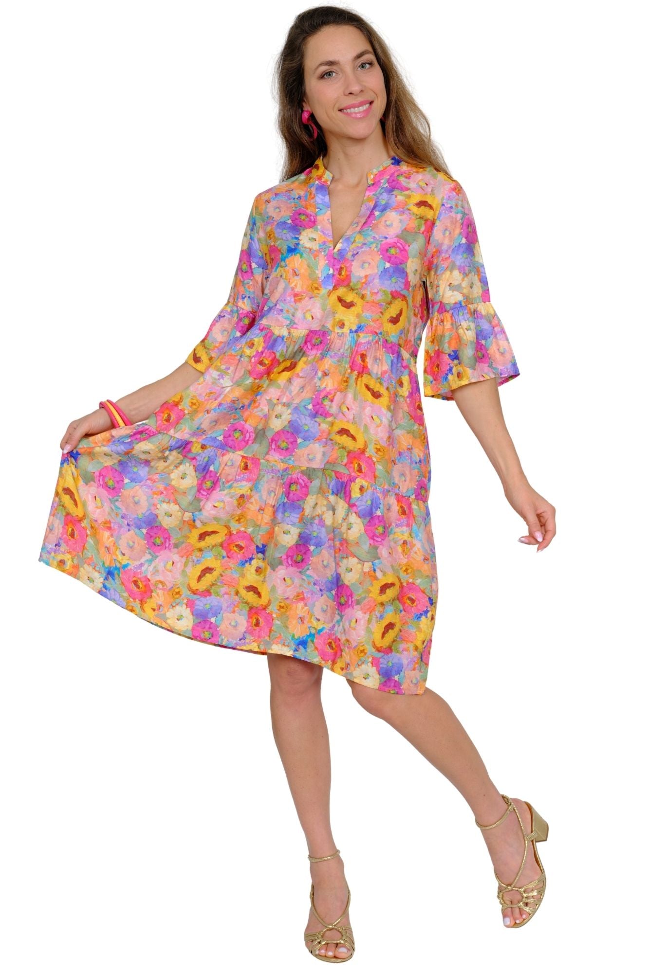 Women's colorful floral tiered dress with flowy silhouette and ruffle sleeves